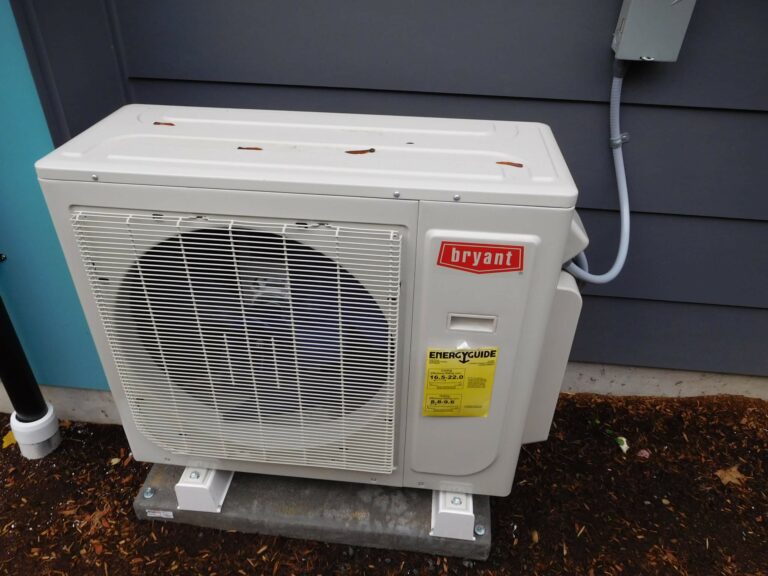 An air conditioning unit on the exterior of the house.